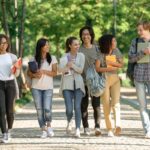 Students Walking On College Campus